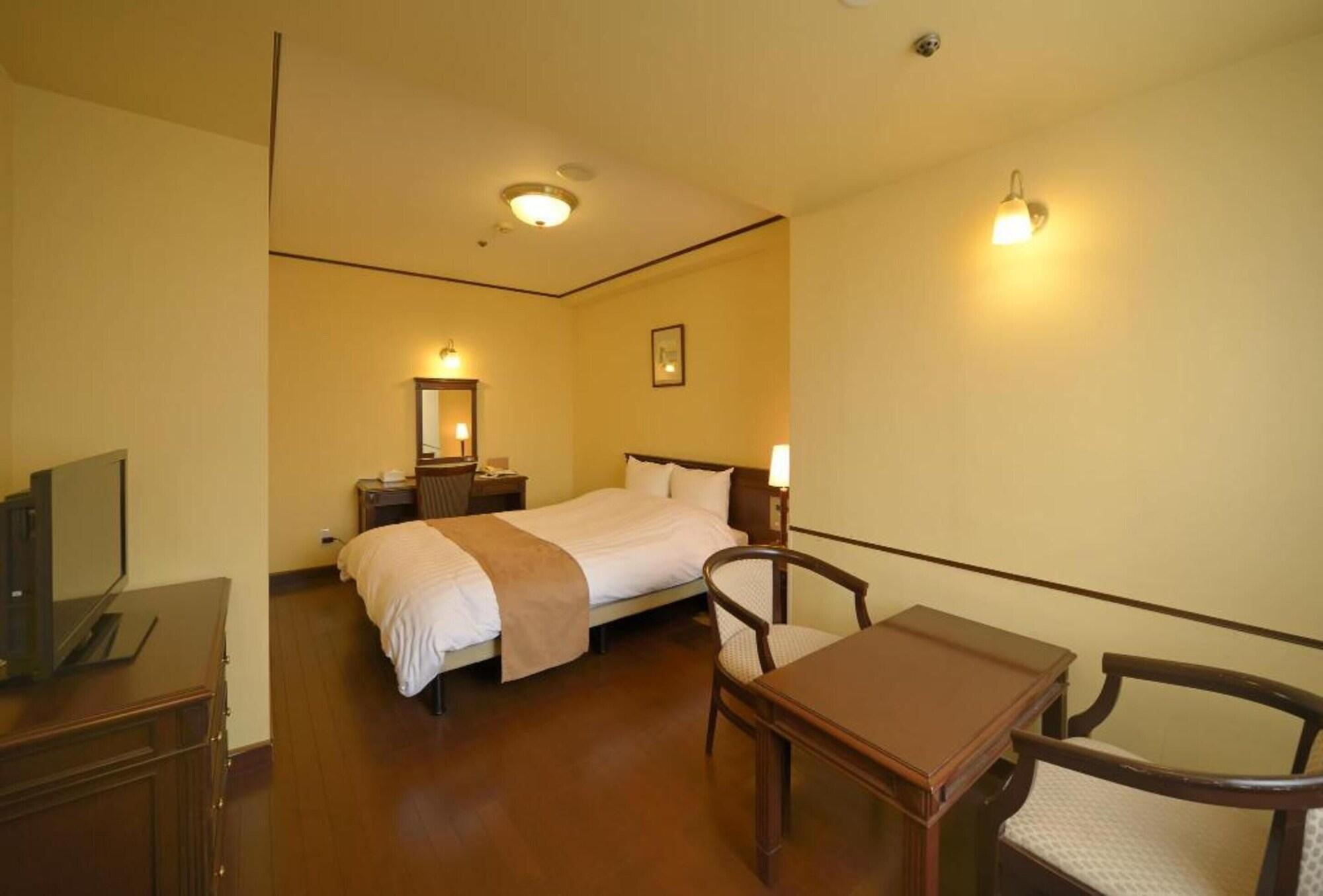 Amami Sunplaza Hotel Exterior photo