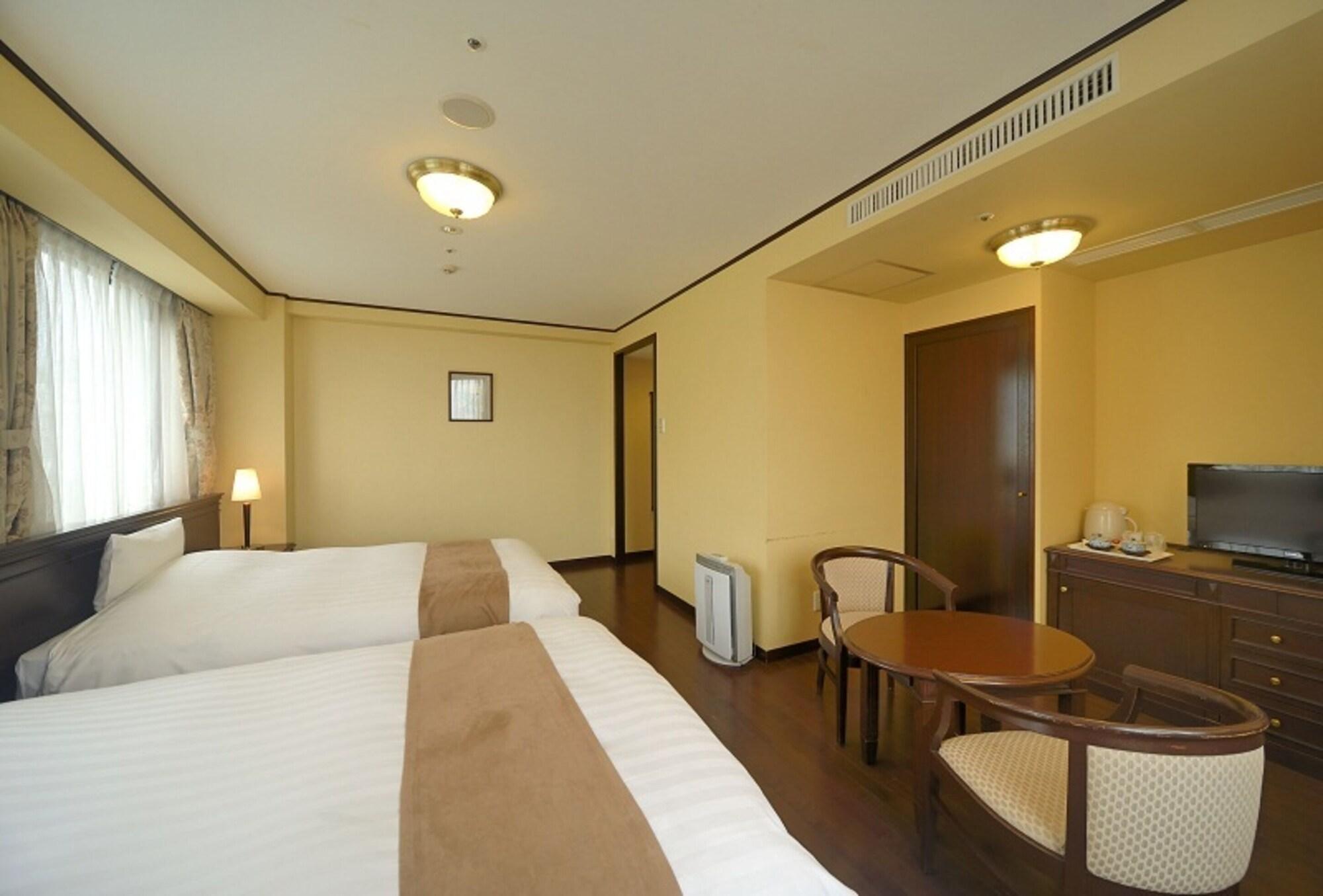 Amami Sunplaza Hotel Exterior photo